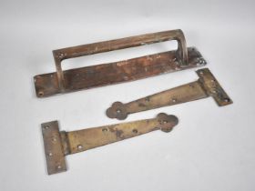 A Vintage Brass Door Handle and a Pair of Vintage Brass Door Hinges, Handle 35.5cms High