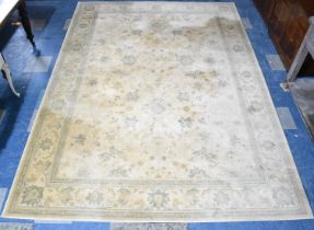 A Large Patterned Rug on Faun Ground, 347x250cm