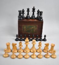 A Victorian Boxed Set of Weighted Staunton Chess Pieces in Boxwood, Kings 9.25cms High