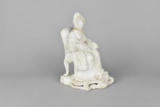 A Derby Biscuit Porcelain Figure of Lady Modelled Seated on Armchair, 16.5cm high