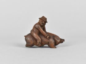 A Small Carved Novelty in the Form of a Farmer Riding Pig, Probably Black Forest Souvenir, 6cms