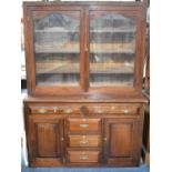 An Edwardian Country House Kitchen Cabinet, the Base Section with Two Long Drawers Over Bank of