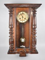 An Edwardian Mahogany Vienna Style Wall Clock with Eight Day Movement and Half Pilaster Decoration