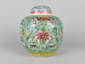 A Chinese Porcelain Enamel Ginger Jar Decorated in the Famille Rose Palette with Flowers, Bats and