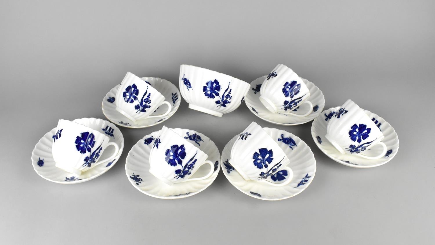 A Set of 19th Century Porcelain Blue and White Cups and Saucers of Reeded Form Decorated with