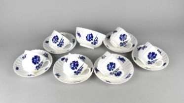A Set of 19th Century Porcelain Blue and White Cups and Saucers of Reeded Form Decorated with