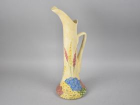 A Mid 20th Century Radford Ewer with Elongated Body Decorated with Flowers, 39cms High