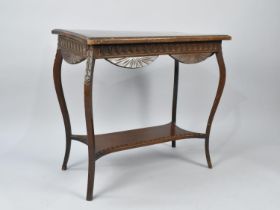 An Edwardian Rectangular Occasional Table with Carved Border and Cabriole Supports, Somewhat