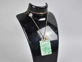 A 14ct Gold and Mottled Green Jade Carved Rectangular Pendant with Phoenix to One Side and Maiden