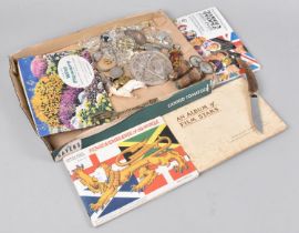 A Collection of Curios to include Tea and Cigarette Card Albums, Costume Jewellery, Bottle Opener