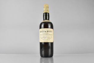 A Bottle of "Black and White" Special Blend of Buchanan's Choice Old Scotch Whisky, Spring Cap