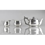 An Edwardian Silver Three Piece Bachelor's Tea Service by William Hutton & Sons Ltd to Comprise