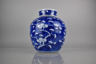 A Large 19th Century Chinese Qing Dynasty Blue and White Prunus Pattern Ginger Jar and Cover, Four