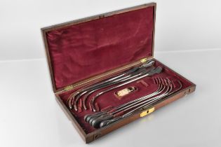 A Late Victorian/Edwardian Mahogany Cased Medical Set of Various Graduated Urethral Dilators Two