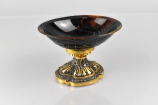 A 19th Century Agate and Parcel Gilt White Metal Pedestal Dish, the Deep Turned Agate Dish Raised on