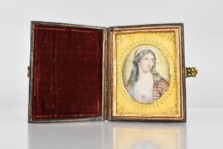 A 19th Century Portrait of a Maiden Painted on Ivory in a Leather Folding Travelling Case, Miniature