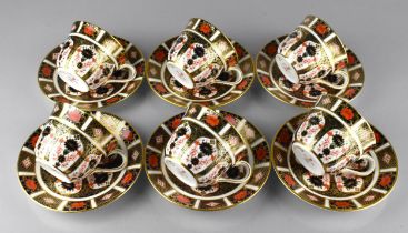 A Royal Crown Derby Imari Set of Six Cups and Six Saucers, Pattern No.1128