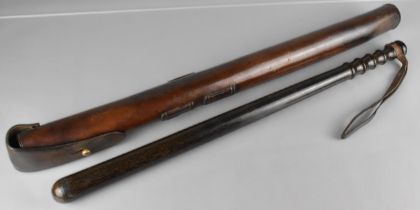 An Early 20th Century Police Officers Truncheon having Leather Strap and Complete with Case,