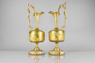 A Pair of Gilt Bronze Ewers of Classical Form, Each Handle with Entwined Serpents and having Hind