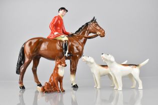 A Beswick Huntsman, Brown Gloss, Designed by Arthur Gredington Together with Two Foxhounds, Model