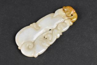 A Carved Jade Pendant Modelled as Gourd, 5cms Long