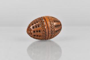 A 19th Century Carved Coquilla Nut Pomander Modelled as an Egg, 6cm High