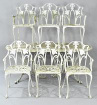 A Late 20th Century White Painted Cast Metal Garden Patio Set, Comprising Oval Table and Six