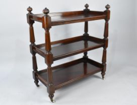 A Small Victorian Mahogany Three Tier Buffet with Galleried Shelves and Reeded Supports,