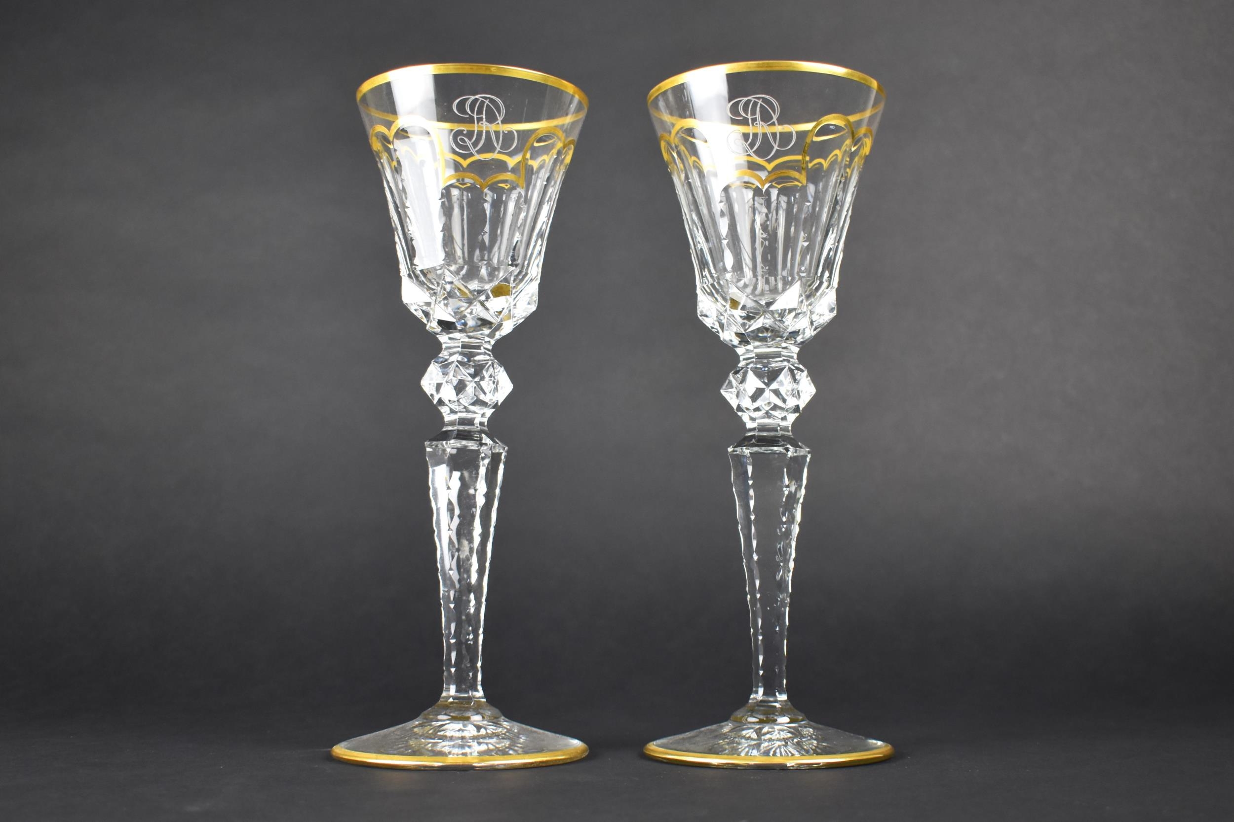A Pair of St Louis Crystal Wine Glasses, the Facet-Cut Bowls with Gilt Trim and Scalloped Detail,