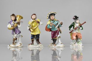 Three 20th Century Volkstedt Porcelain Monkey Band Figures Together With A Dresden Porcelain