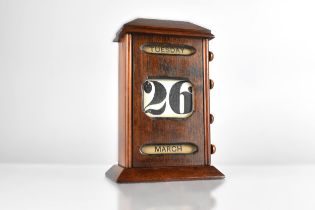 An Edwardian Oak Desktop Perpetual Calendar with Day, Date and Month, 21cm High