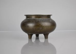A Chinese Bronze Tripod Censer, 9cm High