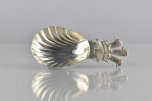 An Elizabeth II Silver Caddy Spoon by Roberts & Belk having Prince of Wales Feather Device Finial to