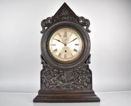 A Large Late 19th Century Chinese Hardwood Clock of Architectural Form and Decorated in Carved