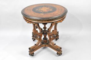 A Victorian Marquetry Amboyna Ebony and Gilt Inlaid Centre Table in the French Style With Centre