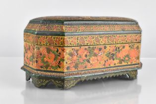 A Kashmiri Box of Rectangular Form having Canted Edges and Raised on Bracket Feet, The Removable Lid