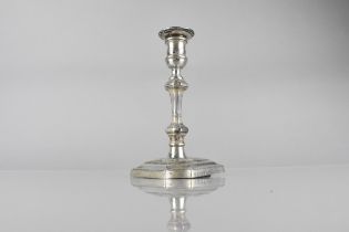 A George V Silver Candlestick by Hawksworth, Eyre and Co Ltd, on Tapering Square Canted and Weighted