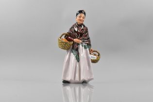 A Royal Doulton Figure, The Orange Lady, H1759