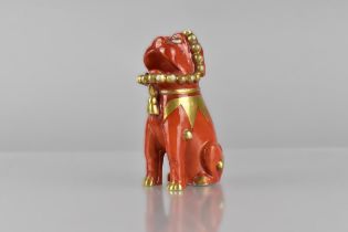 A Chinese Qing Dynasty Porcelain Study of a Temple Lion/Foo Dog in Iron Red Glaze with Gilt