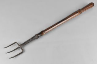 An 18th Century George III Toasting Fork With a Long Turned Laburnum Handle, 53cm Long