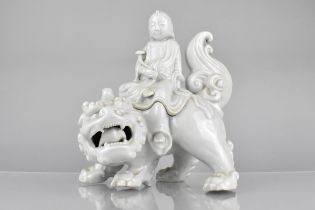 A Chinese/Japanese Qing Dynasty Porcelain Blanc De Chine Figural Pot and Cover Depicting the Deity