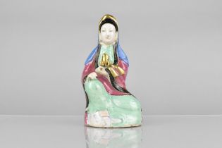 A Chinese Qing Dynasty, 18th Century, Porcelain Study of Seated Maiden Decorated in Polychrome