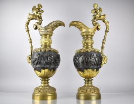 A Large and Impressive Pair of French Gilt Bronze Decorative Ornamental Ewers Decorated in Relief