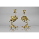 A Pair of Gilt Bronze Candlesticks Modelled as Cranes Standing Upon Tortoises Supporting Scrolled