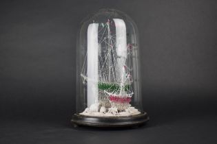A 19th Century Glass Dome Containing Two Spun Glass 'Frigger Ships' on a Shellwork Base, 28cm High