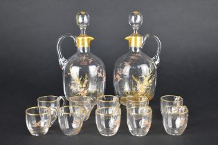 An Early 20th Century Painted Glass Tot Set Decorated With Birds in Flight Jugs, 19cm High