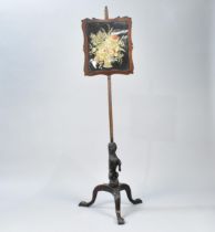 A Mid 19th Century Mahogany Pole Fire Screen with Silk Work Panel Set on Tripod Support with