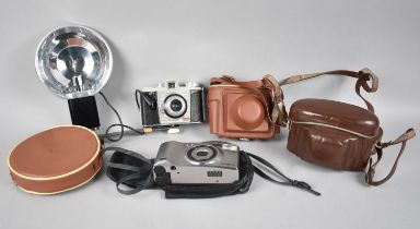 A Collection of Various Vintage Camera and Camera Cases