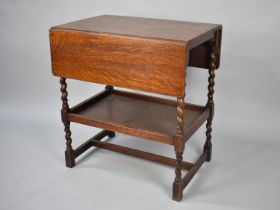 A Mid 20th Century Oak Barley Twist Two Tier Drop Leaf Trolley, 65cms Wide