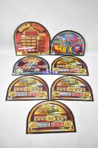 A Collection of Seven Various Arched One Arm Bandit Signs, Prints on Glass